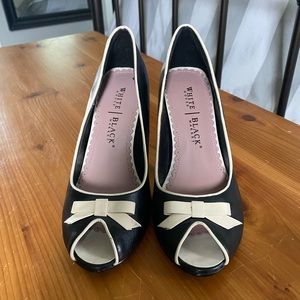 WHBM Black peep toe heels with ivory trim and bow